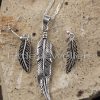 Finely detailed elegant leaf pendant with matching earrings