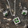 Light up your look with this silver cz emerald necklace set