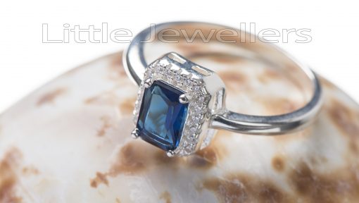 A magical silver blue ring deserves to sparkle on some lucky lady's finger!
