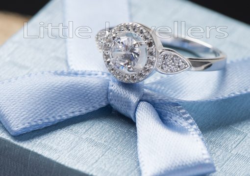 A brilliant silver halo style Engagement ring