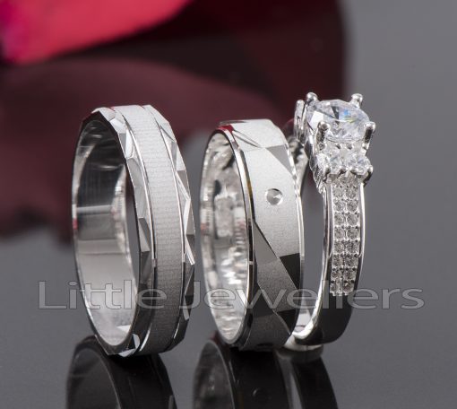 Sparkle and shine with this set of wedding rings for him & her