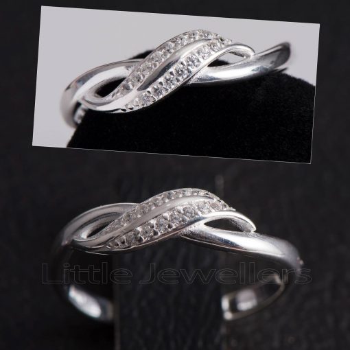 A dainty twisted infinity design promise ring.