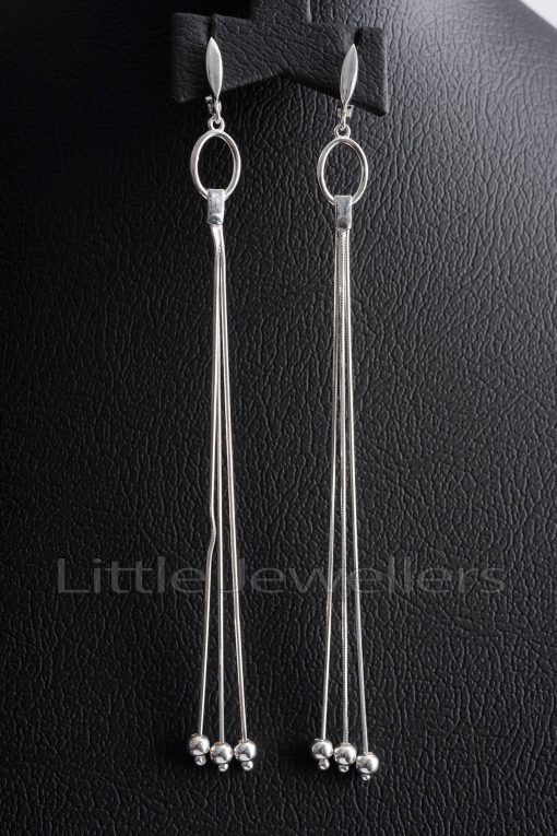 A pair of long & graceful sterling silver dangling earrings 