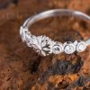 An adorable and feminine snow flake promise ring