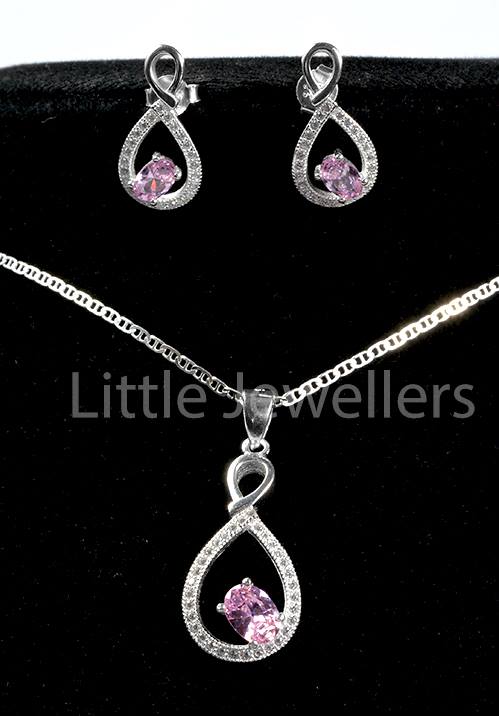This shimmering necklace and stud earring set is crafted in sterling silver