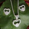 A Chic And Stylish Heart Shaped Pendant Necklace Set with Matching Earrings.