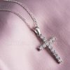 A cubic zirconia & silver cross pendant necklace
