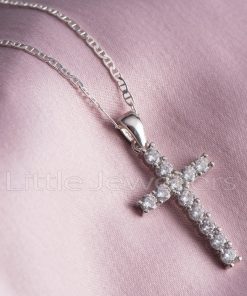 A cubic zirconia & silver cross pendant necklace