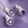 An amethyst matching necklace & earring set that represents royalty and strength.
