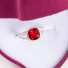 This magnificent vibrant red engagement ring is a true definition of love