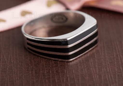 This bold silver male ring features three stripes that gives it a stylish & dashing look.