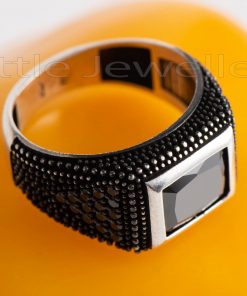 Draw attention with this classic rectangular shaped onyx black male ring