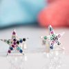 A cute pair of multicolored star shaped silver stud earrings