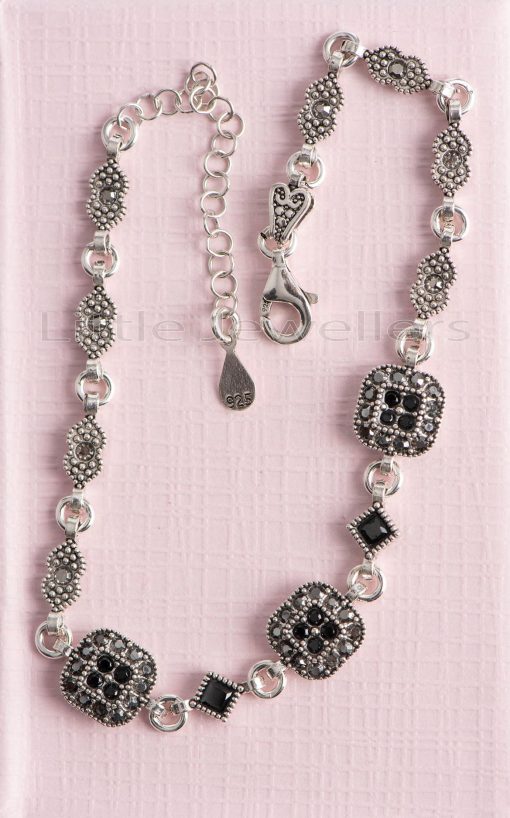 This pretty ladies marcasite silver bracelet features black cz stones that add class & sparkle to your everyday outfits.
