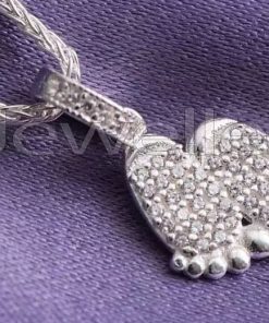 A precious and adorable pair of sterling silver baby footprint pendant necklace