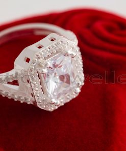 Buy memories from us with this exquisite cz emerald cut silver engagement ring.
