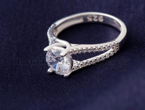 A beautiful sterling silver engagement ring that adds a little sparkle to her life.