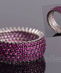 This ring is an eye-catching accessory that is both modern & pretty. Made of silver & embellished all over with pink stones