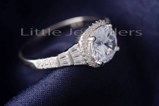 An impressive and stunning round center halo design engagement ring