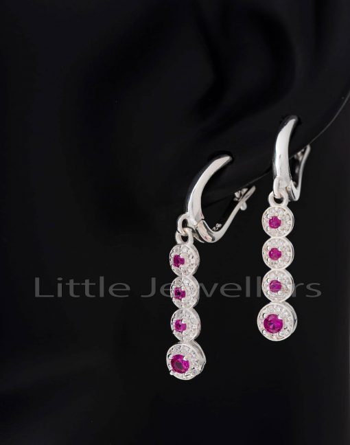 These stunning cz ruby earrings combine style and fashion. Never has jewelry felt so wonderful!
