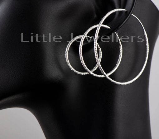 Our silver loop earrings come in a set of three and offer an opulent touch to any exquisite outfit.