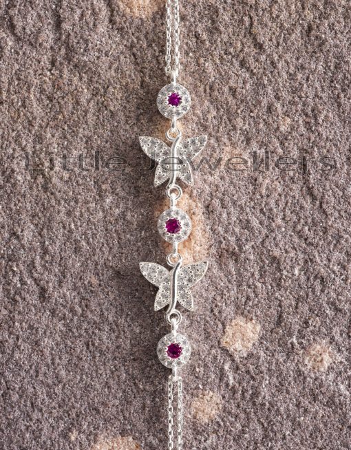 This butterfly bracelet is adorned with red and clear cz stones and is certainly a richness of beauty.