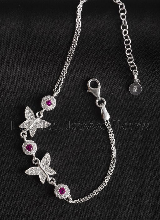 This butterfly bracelet is adorned with red and clear cz stones and is certainly a richness of beauty.