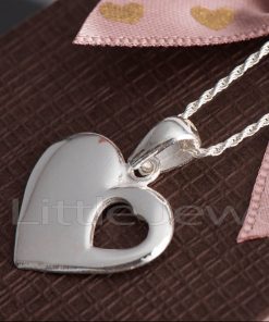 This sterling silver heart-shaped necklace has a smaller open heart at the bottom, making it a perfect choice for you.
