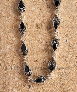 A striking piece that makes a statement. This sterling silver teardrop bracelet will add a unique touch to your jewelry collection.