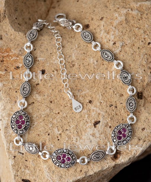 This marcasite and sterling silver bracelet will stand out against any outfit and complement your accessory choices for any occasion.