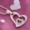 This sterling silver heart pendant features a little heart in the middle with cubic zirconia. It's ideal for anyone who enjoys hearts.