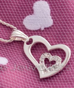This sterling silver heart pendant features a little heart in the middle with cubic zirconia. It's ideal for anyone who enjoys hearts.