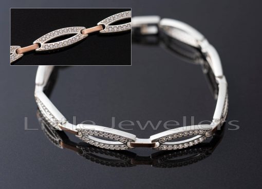 This delicate yet durable gold and silver link bracelet is made of sterling silver and will quickly become a favorite accessory.