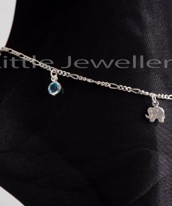 This anklet is made of a flawless silver chain and is embellished with three elephant charms and two tiny aqua marine cz stones to form a single cohesive design.