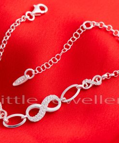 With our infinity bracelet, you can add a touch of glitz to any outfit. This delicate jewelry is made of sterling silver and embellished with cubic zirconia stones.