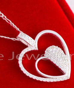 This necklace is a masterpiece! The chain is sterling silver, and the huge pendant heart includes a tiny heart inside with small dazzling cz stones to make it especially special.