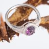 The deep colour of this cz amethyst stone enhances the brilliant sheen of this sterling silver engagement ring, making it a love you'll remember for its beauty, style, and craftsmanship.