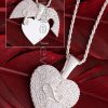 This stunning sterling silver heart necklace can be personalized on the inside with a message, date, or name. It also has an infinity symbol in the middle of the heart, which is a lovely way to express your emotions.