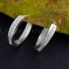 Classic Sterling Silver hoop earrings that may be stacked with your favorite pair for regular wear.