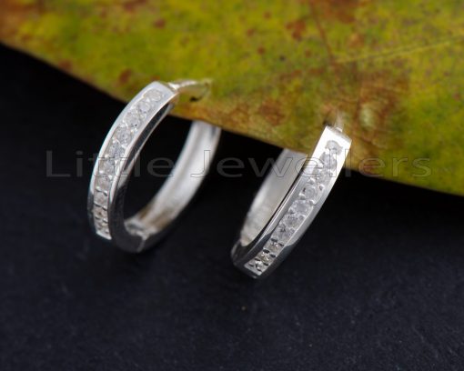 Classic Sterling Silver hoop earrings that may be stacked with your favorite pair for regular wear.