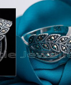 A spectacular marcasite ring with a vine leaf wrap design that will accentuate your creative flair.
