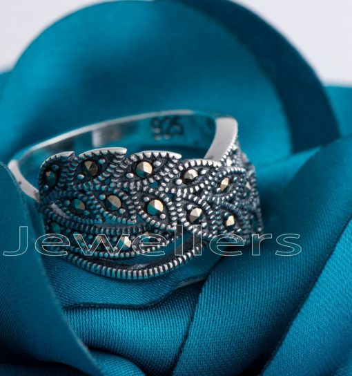 A spectacular marcasite ring with a vine leaf wrap design that will accentuate your creative flair.