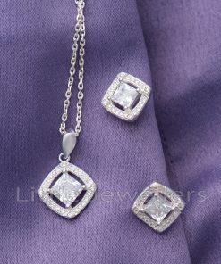 This stunning geometrical pendant and earring jewelry set can be worn together or separately!