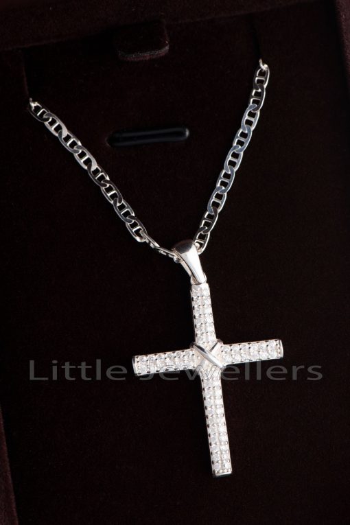 A sterling silver cross pendant necklace enhanced with sparkling micro stones to create a classic and refined look.