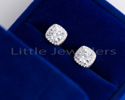 A set of gleaming round cut zirconia stud earrings with a significant extent of radiance.