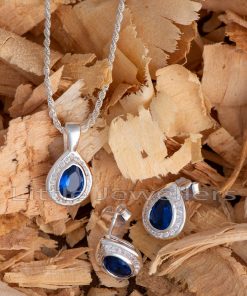 This three-piece set features a pear sapphire cz stone set in silver with a bold blue color & intense sparkle.