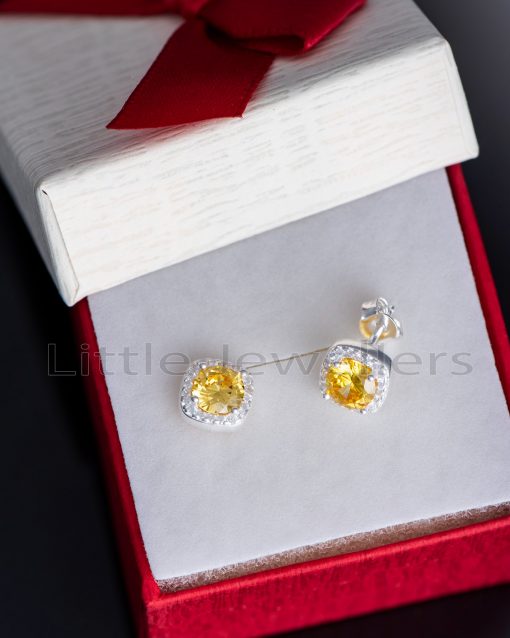 These sterling silver yellow earrings have a lovely halo pattern that is both simple and gorgeous.