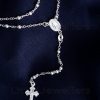 A very intricate silver rosary necklace that serves as a visible reminder of our faith & devotion to prayer