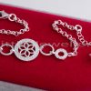 A wonderful Sterling silver flower bracelet with a lovely sparkling pattern on a delicate cable chain.