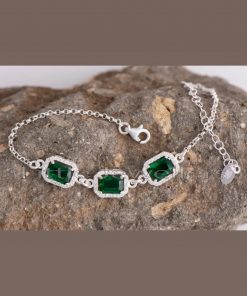 This delicate sterling silver green bracelet is a timeless symbol of faithfulness, value, and health.